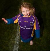 21 November 2021; Kilmacud Crokes' supporter Sinéad Brennan, aged 3, celebrates after the Go Ahead Dublin County Senior Club Football Championship Final match between St Jude's and Kilmacud Crokes at Parnell Park in Dublin. Photo by Daire Brennan/Sportsfile