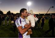 21 November 2021; Craig Dias of Kilmacud Crokes celebrates with his daughter Lola, after the Go Ahead Dublin County Senior Club Football Championship Final match between St Jude's and Kilmacud Crokes at Parnell Park in Dublin. Photo by Daire Brennan/Sportsfile