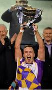 21 November 2021; Kilmacud Crokes' captain Shane Cunningham lifts the cup after the Go Ahead Dublin County Senior Club Football Championship Final match between St Jude's and Kilmacud Crokes at Parnell Park in Dublin. Photo by Ray McManus/Sportsfile