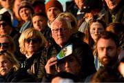 21 November 2021; Nine time GAA All Star Pat Spillane and his wife Rosarii, left, watch the Go Ahead Dublin County Senior Club Football Championship Final match between St Jude's and Kilmacud Crokes at Parnell Park in Dublin. Photo by Ray McManus/Sportsfile