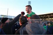 21 November 2021; John McGrath of Loughmore-Castleiney celebrates with supporters after the Tipperary County Senior Club Football Championship Final match between Clonmel Commercials and Loughmore-Castleiney at Semple Stadium in Thurles, Tipperary. Photo by Michael P Ryan/Sportsfile