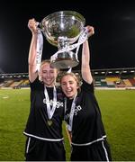 21 November 2021; Wexford Youths players Aoibheann Clancy, left, and Ellen Molloy celebrate with the cup following the 2021 EVOKE.ie FAI Women's Cup Final between Wexford Youths and Shelbourne at Tallaght Stadium in Dublin. Photo by Stephen McCarthy/Sportsfile