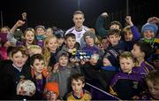 21 November 2021; Paul Mannion of Kilmacud Crokes with his Go-Ahead Ireland Player of the Match award, and fellow club members, after the Go Ahead Dublin County Senior Club Football Championship Final match between St Jude's and Kilmacud Crokes at Parnell Park in Dublin. Photo by Ray McManus/Sportsfile
