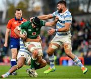 21 November 2021; Caelan Doris of Ireland is tackled by Lucio Cinti, behind, and Marcos Kremer of Argentina during the Autumn Nations Series match between Ireland and Argentina at Aviva Stadium in Dublin. Photo by Seb Daly/Sportsfile