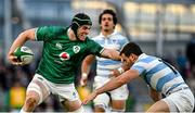21 November 2021; Ryan Baird of Ireland holds off Argentina's Emiliano Boffelli during the Autumn Nations Series match between Ireland and Argentina at Aviva Stadium in Dublin. Photo by Seb Daly/Sportsfile