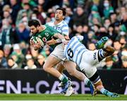 21 November 2021; Robbie Henshaw of Ireland is tackled by Matias Moroni and Pablo Matera, right, of Argentina during the Autumn Nations Series match between Ireland and Argentina at Aviva Stadium in Dublin. Photo by Seb Daly/Sportsfile