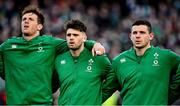 21 November 2021; Ireland players, from left, Ryan Baird, Harry Byrne and Nick Timoney during the national anthem before the Autumn Nations Series match between Ireland and Argentina at Aviva Stadium in Dublin. Photo by Seb Daly/Sportsfile