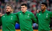 21 November 2021; Ireland players, from left, Andrew Porter, Dan Sheehan and Robert Baloucoune during the national anthem before the Autumn Nations Series match between Ireland and Argentina at Aviva Stadium in Dublin. Photo by Seb Daly/Sportsfile