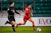 21 November 2021; Jessica Ziu of Shelbourne in action against Lynn Marie Grant of Wexford Youths during the 2021 EVOKE.ie FAI Women's Cup Final between Wexford Youths and Shelbourne at Tallaght Stadium in Dublin. Photo by Stephen McCarthy/Sportsfile