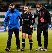 21 November 2021; Orlaith Conlon of Wexford Youths is assisted from the pitch after picking up an injury during the 2021 EVOKE.ie FAI Women's Cup Final between Wexford Youths and Shelbourne at Tallaght Stadium in Dublin. Photo by Stephen McCarthy/Sportsfile