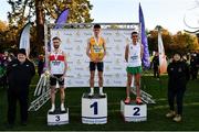21 November 2021; On the podium after the Men's U23 event, are from left, third placed Thomas Mc Stay of Galway City Harriers AC, Galway, Darragh McElhinney of  UCD AC, Dublin, and second placed Keelan Kilrehill of Moy Valley AC, Mayo, during the Irish Life Health National Cross Country Championships at Santry Demense in Dublin. Photo by Ramsey Cardy/Sportsfile