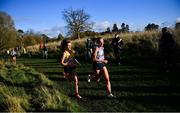 21 November 2021; Danielle Donegan of UCD AC, Dublin, left, and Meghan Ryan of Dundrum South Dublin AC, Dublin, competing in the Senior Women's event during the Irish Life Health National Cross Country Championships at Santry Demense in Dublin. Photo by Ramsey Cardy/Sportsfile