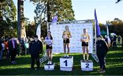 21 November 2021; The podium following the Senior Women's event, from left, third placed Roisin Flanagan of Finn Valley AC, Donegal, first placed Michelle Finn of Leevale AC, Cork, and second placed Sarah Healy of UCD AC, Dublin, during the Irish Life Health National Cross Country Championships at Santry Demense in Dublin. Photo by Ramsey Cardy/Sportsfile