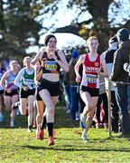 21 November 2021; Sarah Bateson of Clonliffe Harriers AC, Dublin, left, and Michelle Healy of Ennis Track AC, Clare, competing in the Junior Women's event during the Irish Life Health National Cross Country Championships at Santry Demense in Dublin. Photo by Ramsey Cardy/Sportsfile