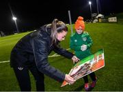 22 November 2021; Katie McCabe with supporter Emily Keegan, age 7, from Tallaght, following a Republic of Ireland Women training session at the FAI National Training Centre in Abbotstown, Dublin. Photo by Stephen McCarthy/Sportsfile