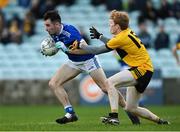 7 November 2021; Kevin McGettigan of Naomh Conaill in action against Eoin McGeehin of St Eunan's during the Donegal County Senior Club Football Championship Final match between St Eunan's and Naomh Conaill at MacCumhaill Park in Ballybofey, Donegal. Photo by Ramsey Cardy/Sportsfile