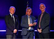 20 November 2021; Máistir na gceisteanna Aodán Ó Braonáin is presented with an award by Leinster GAA Chairman Pat Teehan, right, and Connacht GAA Council President John Murphy during the Scór Sinsir 2020 All-Ireland Finals at the Connacht GAA Air Dome in Bekan, Mayo. Photo by Piaras Ó Mídheach/Sportsfile