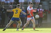 21 November 2021; Ryan O'Donoghue of Belmullet in action against David McHale of Knockmore during the Mayo County Senior Club Football Championship Final match between Knockmore and Belmullet at James Stephen's Park in Ballina, Mayo. Photo by Piaras Ó Mídheach/Sportsfile