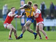 21 November 2021; Kieran King of Knockmore in action against Ryan O'Donoghue, left, and Marty Boylan of Belmullet during the Mayo County Senior Club Football Championship Final match between Knockmore and Belmullet at James Stephen's Park in Ballina, Mayo. Photo by Piaras Ó Mídheach/Sportsfile