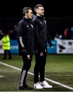 19 November 2021; Patrick McEleney of Dundalk, right, in conversation with Derry City physiotherapist Michael Hegarty after the SSE Airtricity League Premier Division match between Dundalk and Derry City at Oriel Park in Dundalk, Louth. Photo by Ben McShane/Sportsfile