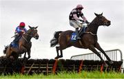 25 November 2021; Braganza, right, with Sean O'Keeffe up, jumps the last on their way to winning the BetVictor Irish EBF Mares Maiden Hurdle at Thurles Racecourse in Tipperary. Photo by Seb Daly/Sportsfile