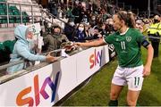 25 November 2021; Republic of Ireland captain Katie McCabe gives her boots to Aoibhe Buckley age 10, of Clondalkin Celtics in Clondalkin, Dublin, and Millie Brazell, age 11, from Clondalkin, Dublin, after the FIFA Women's World Cup 2023 qualifying group A match between Republic of Ireland and Slovakia at Tallaght Stadium in Dublin. Photo by Eóin Noonan/Sportsfile