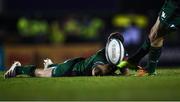 26 November 2021; Kieran Marmion of Connacht, hidden, after holding the ball in place for team-mate Jack Carty for a conversion attempt, in strong wind, during the United Rugby Championship match between Connacht and Ospreys at The Sportsground in Galway. Photo by Piaras Ó Mídheach/Sportsfile