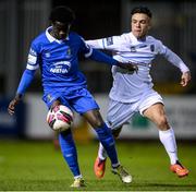 26 November 2021; Junior Quitirna of Waterford in action against Sean Brennan of UCD during the SSE Airtricity League Promotion / Relegation Play-off Final between UCD and Waterford at Richmond Park in Dublin. Photo by Stephen McCarthy/Sportsfile