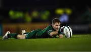 26 November 2021; Kieran Marmion of Connacht holding the ball in place for team-mate Jack Carty for a conversion attempt, in strong wind, during the United Rugby Championship match between Connacht and Ospreys at The Sportsground in Galway. Photo by Piaras Ó Mídheach/Sportsfile