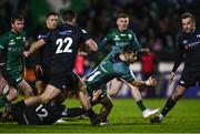 26 November 2021; Caolin Blade of Connacht breaks through the attempted tackle from Joe Hawkins of Ospreys on his way to scoring his side's sixth try during the United Rugby Championship match between Connacht and Ospreys at The Sportsground in Galway. Photo by David Fitzgerald/Sportsfile