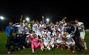 26 November 2021; UCD players celebrate after their side's victory in the SSE Airtricity League Promotion / Relegation Play-off Final between UCD and Waterford at Richmond Park in Dublin. Photo by Stephen McCarthy/Sportsfile