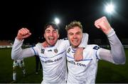 26 November 2021; Luke Boore, left, and Mark Dignam of UCD celebrate after their side's victory in the SSE Airtricity League Promotion / Relegation Play-off Final between UCD and Waterford at Richmond Park in Dublin. Photo by Stephen McCarthy/Sportsfile