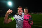 26 November 2021; Jack Keaney, left, and goalkeeper Lorcan Healy of UCD celebrate after their side's victory in the SSE Airtricity League Promotion / Relegation Play-off Final between UCD and Waterford at Richmond Park in Dublin. Photo by Stephen McCarthy/Sportsfile