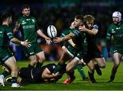 26 November 2021; Peter Robb of Connacht offloads to team-mate Caolin Blade as he is tackled by Jac Morgan of Ospreys in the build up to their fifth try during the United Rugby Championship match between Connacht and Ospreys at The Sportsground in Galway. Photo by David Fitzgerald/Sportsfile