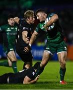 26 November 2021; Peter Robb of Connacht is tackled by Dan Evans, bottom, and Jac Morgan of Ospreys during the United Rugby Championship match between Connacht and Ospreys at The Sportsground in Galway. Photo by David Fitzgerald/Sportsfile