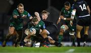 26 November 2021; Niall Murray of Connacht is tackled by Sam Cross, left, and Elvis Taione of Ospreys during the United Rugby Championship match between Connacht and Ospreys at The Sportsground in Galway. Photo by Piaras Ó Mídheach/Sportsfile