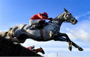 27 November 2021; Dunvegan, with Bryan Cooper up, jumps the last on their way to winning the EasyFix Equine Handicap Steeplechase on day one of the Fairyhouse Winter Festival at Fairyhouse Racecourse in Ratoath, Meath. Photo by Seb Daly/Sportsfile