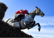 27 November 2021; Dunvegan, with Bryan Cooper up, jumps the last on their way to winning the EasyFix Equine Handicap Steeplechase on day one of the Fairyhouse Winter Festival at Fairyhouse Racecourse in Ratoath, Meath. Photo by Seb Daly/Sportsfile