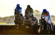 27 November 2021; Lord Lariat, left, with Joanna Walton up, jumps the last trailing to eventual second place Favori Logique, centre, with Maxine O'Sullivan up, and third place O Connell Street, right, with Laura Costello up, on their way to winning the Fairyhouse Ladies Handicap Steeplechase on day one of the Fairyhouse Winter Festival at Fairyhouse Racecourse in Ratoath, Meath. Photo by Seb Daly/Sportsfile