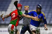 27 November 2021; Darren Maher of Clough-Ballacolla in action against Alan Tobin of Rapparees during the AIB Leinster GAA Hurling Senior Club Championship Quarter-Final match between Clough-Ballacolla and Rapparees at MW Hire O'Moore Park in Portlaoise, Laois. Photo by Sam Barnes/Sportsfile