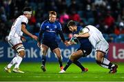 27 November 2021; Ross Byrne of Leinster is tackled by Marty Moore of Ulster during the United Rugby Championship match between Leinster and Ulster at RDS Arena in Dublin.  Photo by Piaras Ó Mídheach/Sportsfile