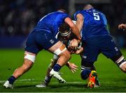 27 November 2021; Rob Herring of Ulster is tackled by Scott Penny, left, and Devin Toner of Leinster  during the United Rugby Championship match between Leinster and Ulster at RDS Arena in Dublin. Photo by David Fitzgerald/Sportsfile