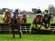28 November 2021; Statuaire, with Danny Mullins up, left, jump the last behind eventual second, My Mate Mozzie, with Darragh O'Keeffe up, on their way to winning the BARONERACING.COM Royal Bond Novice Hurdle on day two of the Fairyhouse Winter Festival at Fairyhouse Racecourse in Ratoath, Meath. Photo by David Fitzgerald/Sportsfile