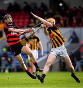 28 November 2021; Kevin Mahony of Ballygunner in action against Peter Casey of Ballyea during the AIB Munster Club Senior Hurling Championship Quarter-Final match between Ballyea and Ballygunner at Cusack Park in Ennis, Clare. Photo by Ray McManus/Sportsfile
