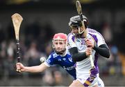28 November 2021; Mark Howard of Kilmacud Crokes in action against David Hickey of Raharney Hurling Club during the 2021 AIB Leinster Club Senior Hurling Championship Quarter-Final match between Raharney Hurling Club and Kilmacud Crokes at TEG Cusack Park in Mullingar, Westmeath. Photo by Dáire Brennan/Sportsfile