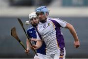 28 November 2021; Dara Purcell of Kilmacud Crokes in action against Darren Finn of Raharney Hurling Club during the 2021 AIB Leinster Club Senior Hurling Championship Quarter-Final match between Raharney Hurling Club and Kilmacud Crokes at TEG Cusack Park in Mullingar, Westmeath. Photo by Dáire Brennan/Sportsfile