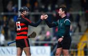 28 November 2021; Harry Ruddle of Ballygunner and referee John O'Halloran after the AIB Munster Club Senior Hurling Championship Quarter-Final match between Ballyea and Ballygunner at Cusack Park in Ennis, Clare. Photo by Ray McManus/Sportsfile