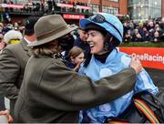 28 November 2021; Rachael Blackmore is embraced by Caroline Alexander, wife of owner Kenneth Alexander, after winning the BARONERACING.COM Hatton's Grace Hurdle on Honeysuckle during day two of the Fairyhouse Winter Festival at Fairyhouse Racecourse in Ratoath, Meath. Photo by David Fitzgerald/Sportsfile