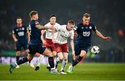 28 November 2021; Ross Tierney of Bohemians in action against Paddy Barrett, left, and Jamie Lennon of St Patrick's Athletic during the Extra.ie FAI Cup Final match between Bohemians and St Patrick's Athletic at Aviva Stadium in Dublin. Photo by Stephen McCarthy/Sportsfile