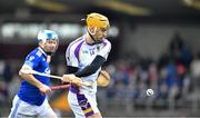 28 November 2021; Ronan Hayes of Kilmacud Crokes in action against Mark Glennon of Raharney during the 2021 AIB Leinster Club Senior Hurling Championship Quarter-Final match between Raharney Hurling Club and Kilmacud Crokes at TEG Cusack Park in Mullingar, Westmeath. Photo by Daire Brennan/Sportsfile